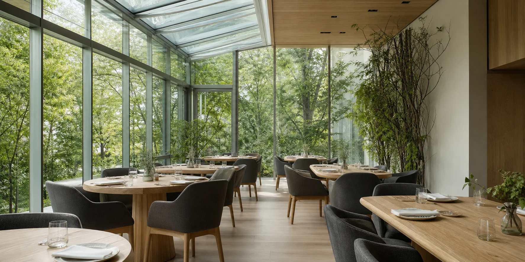 The light-filled dining room inside the fictional Lumen garden pavilion